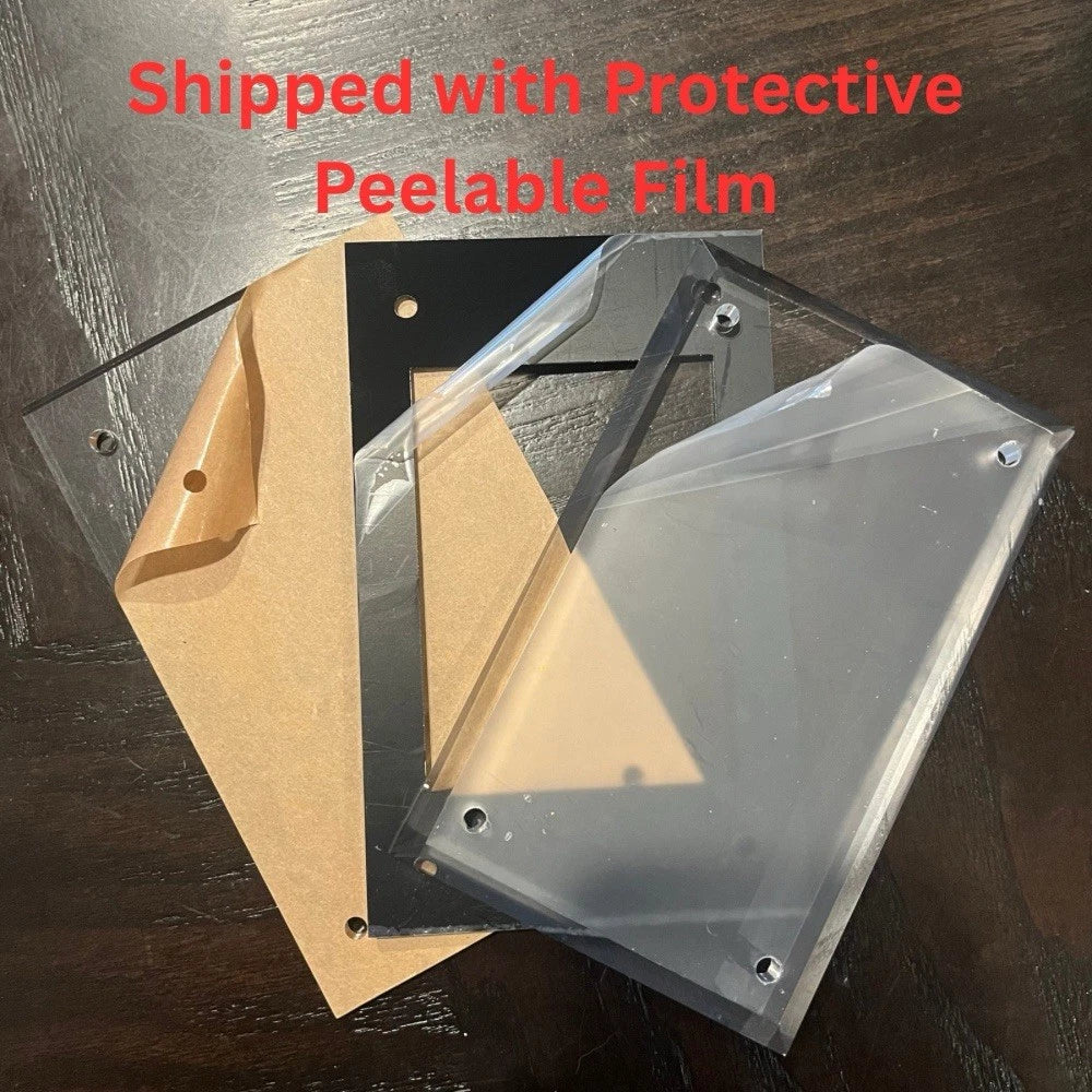 A picture of the acrylic pieces of a screwdown case with a protective film.
