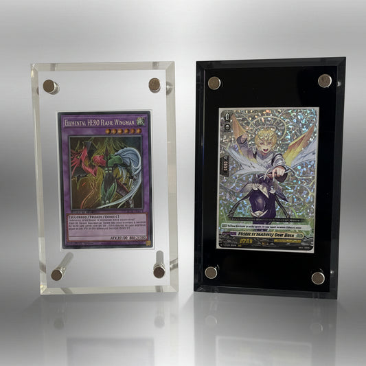 Two japanese sized trading cards in acrylic display stands on a white surface with a neutral background