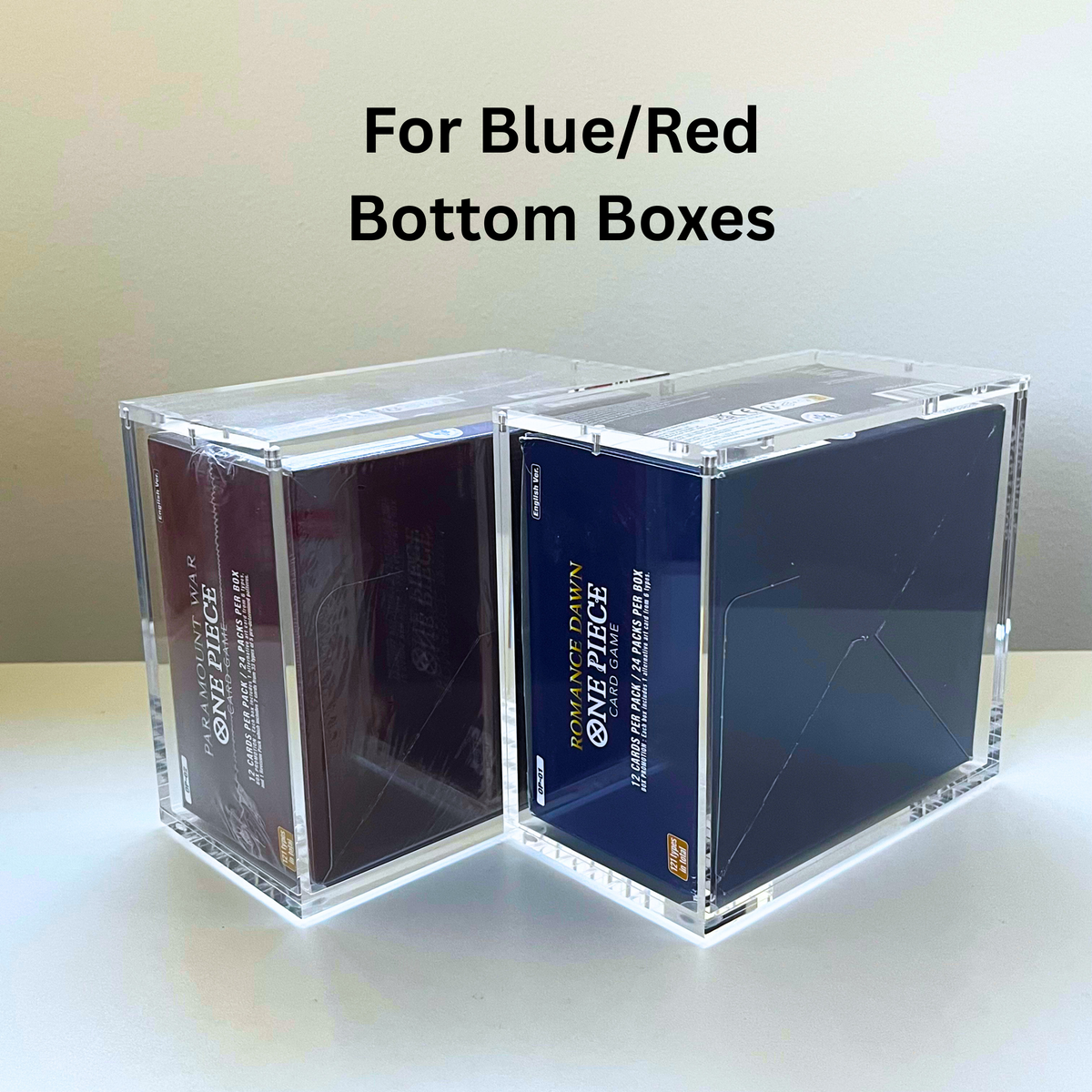 Two clear acrylic gaming bottom boxes shown on a light surface against a pale background, with text reading 'For Blue/Red Bottom Boxes.' The boxes are displayed over dark blue and dark red game box bottoms, and the Gen Gaming logo is visible in the upper left.