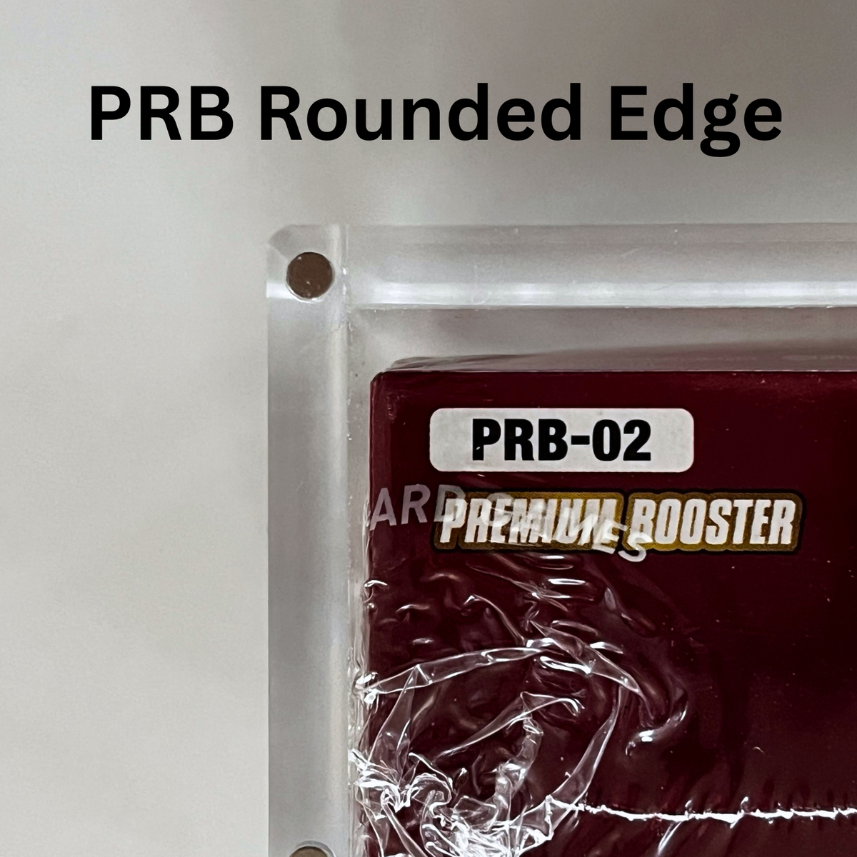 One Piece PRB-02 Premium Booster in an acrylic case with a sharp edge. 