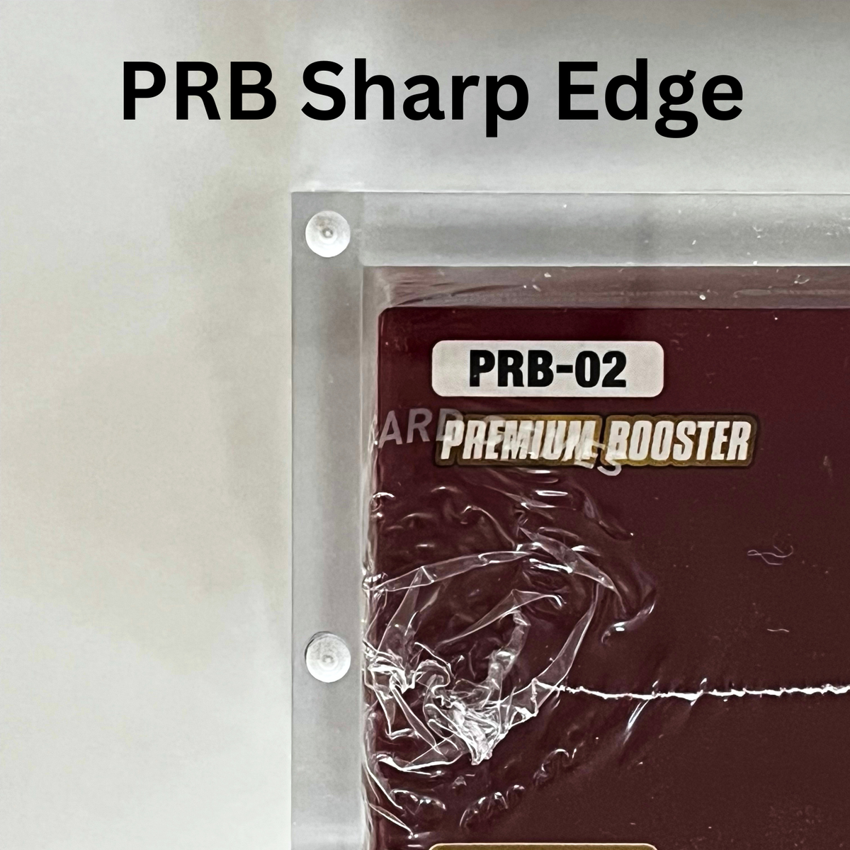 One Piece PRB-02 Premium Booster in an acrylic case with a sharp edge. 