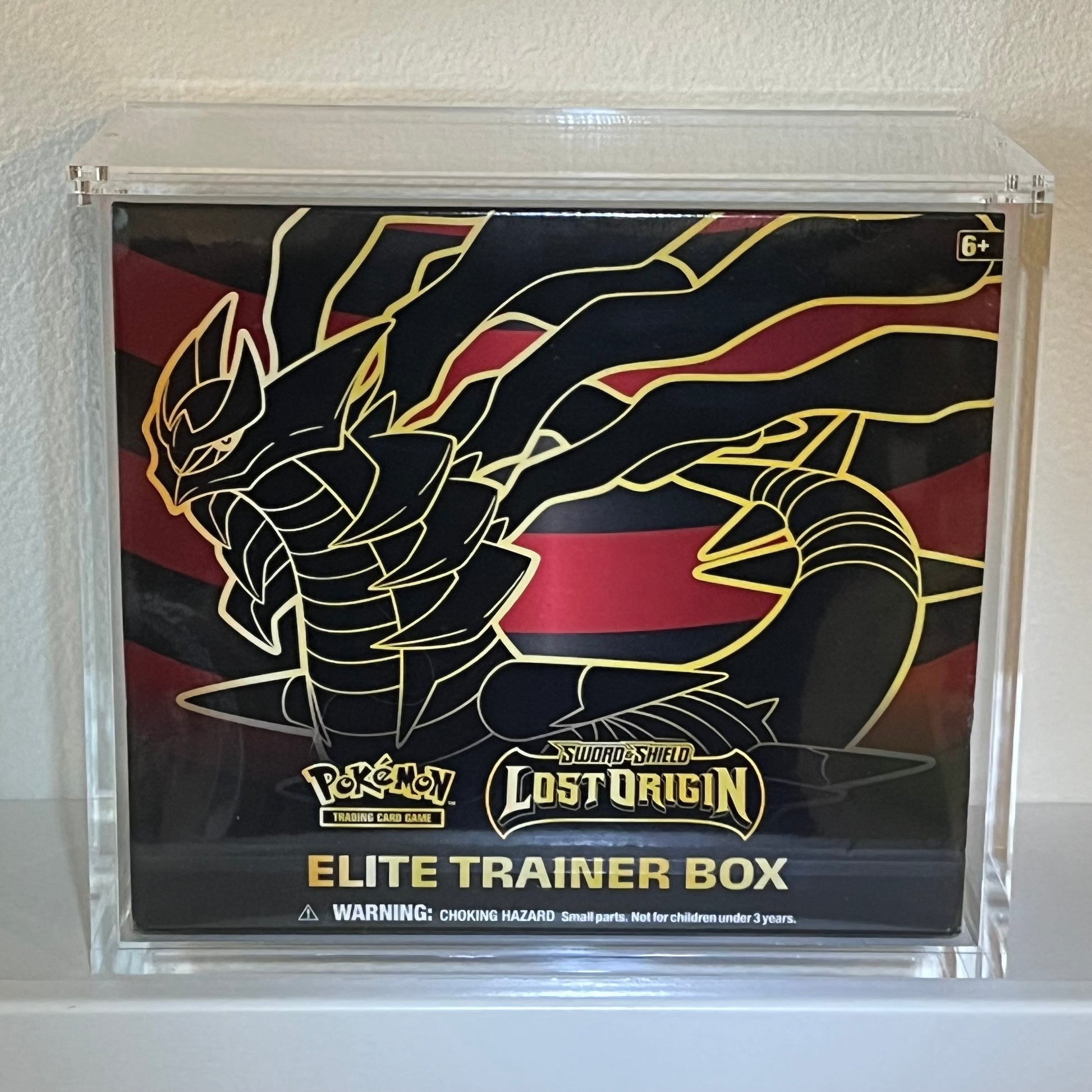 Pokémon Elite Trainer Box Lost Origin in a museum quality acrylic display case.