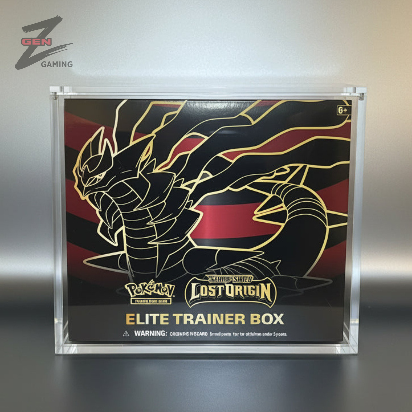 A Pokémon TCG Lost Origin Elite Trainer Box housed in a clear acrylic display case.