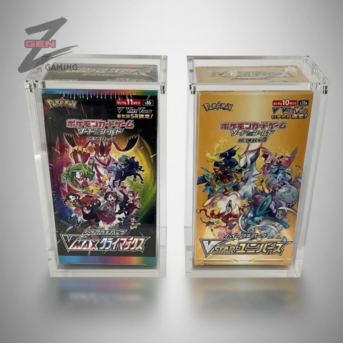 Two Japanese Pokémon trading card Booster Boxes in clear cases on a white background